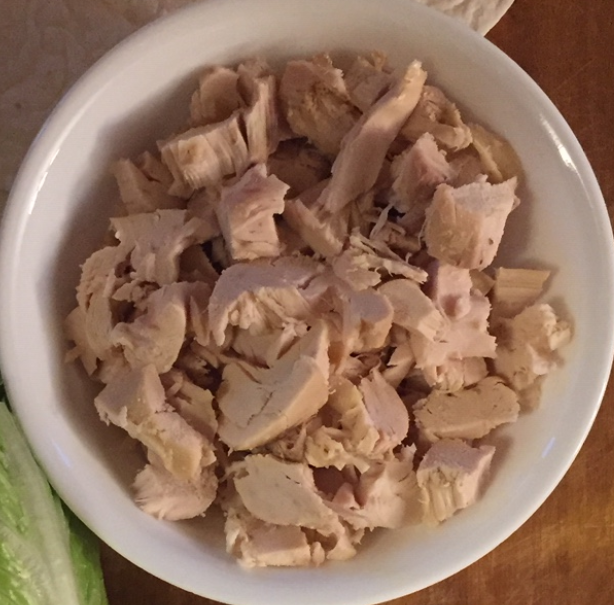 chopped up chicken in a bowl