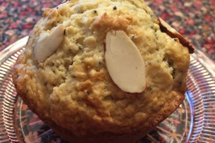 almond poppyseed muffin on a plate