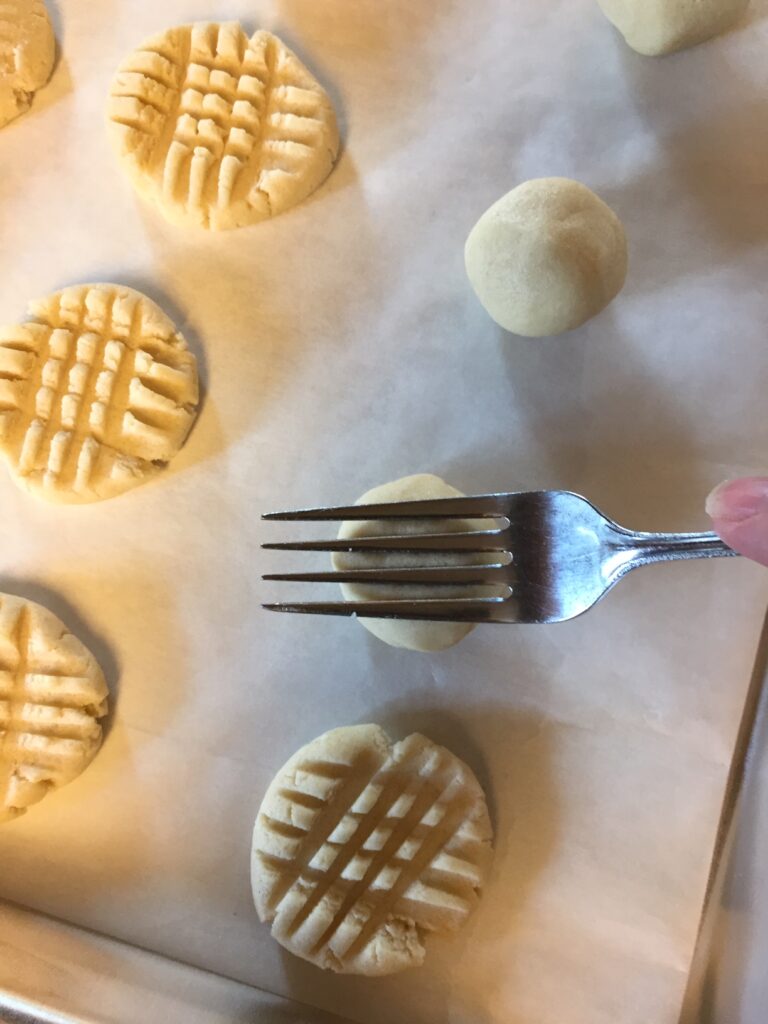 flattening cookies with a fork