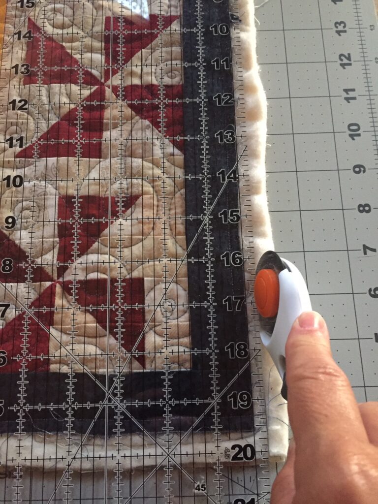 trimming the quilt layers