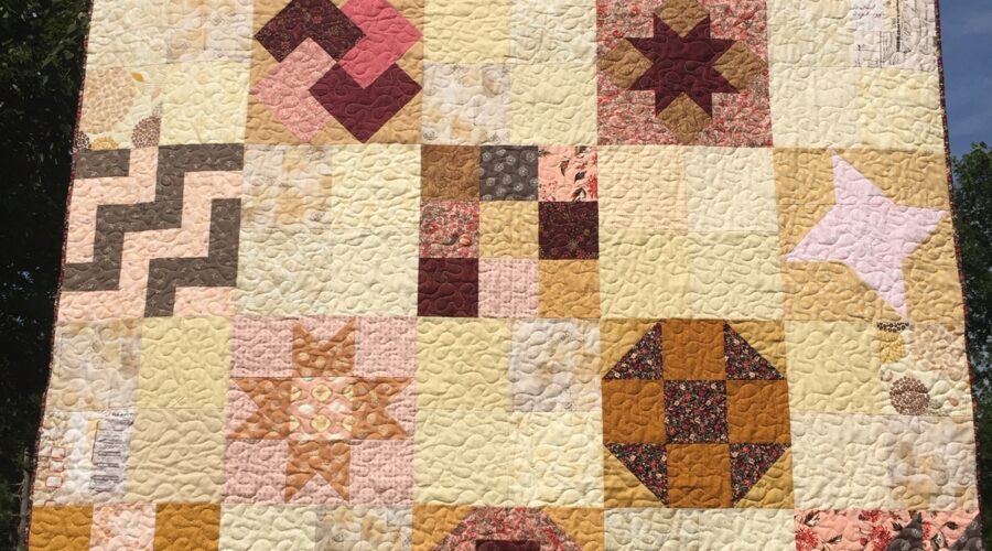 to the nines quilt on display outside