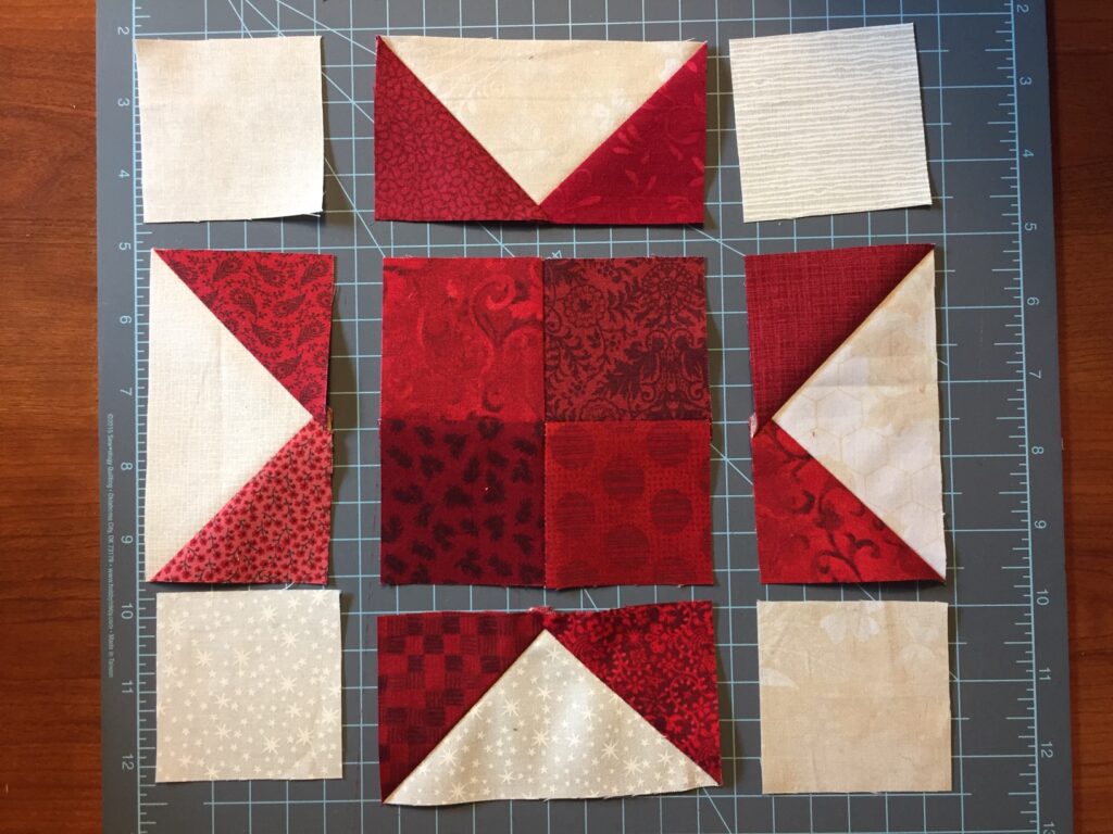 lay out of four patch sawtooth star quilt block