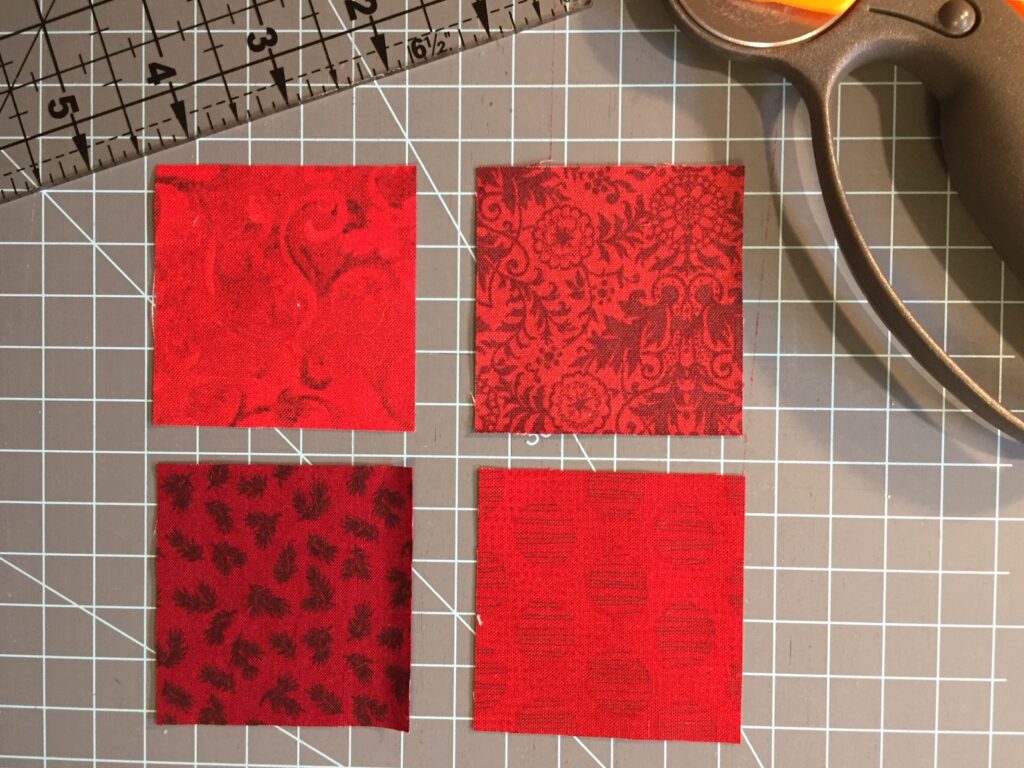 layout of four patch red fabric squares