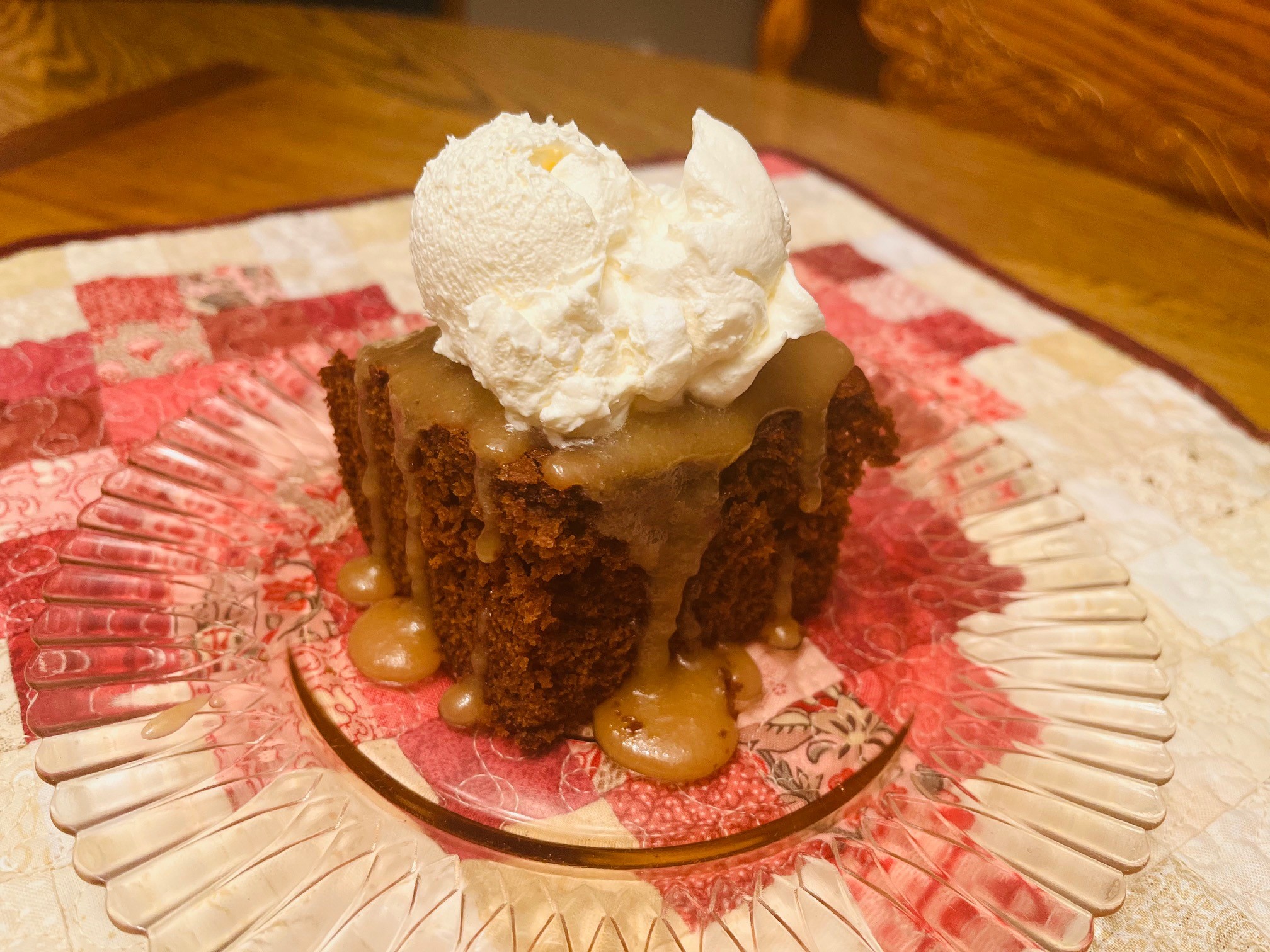 https://lakegirlquilts.com/wp-content/uploads/2021/12/gingerbread-cake-recipe-with-caramel-sauce-and-whipped-cream-on-top2.jpg