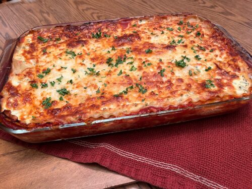 World S Best Lasagna Recipe Lakegirlquilts   Side View Of Baked Pan Of Worlds Best Lasagna 500x375 